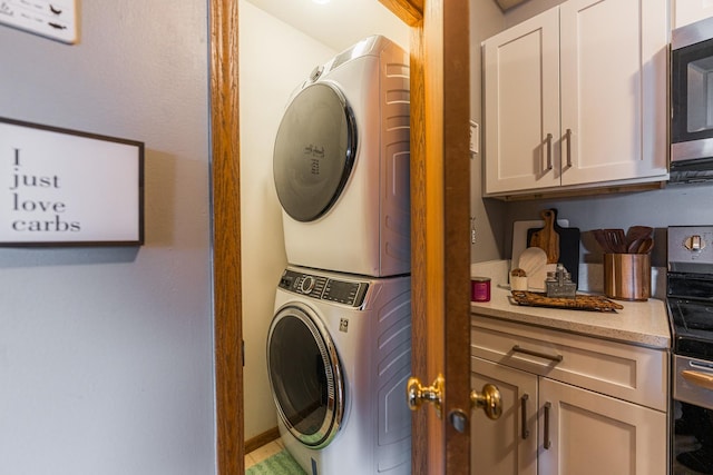 laundry room featuring stacked washer and dryer