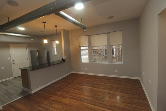 interior space with dark hardwood / wood-style flooring