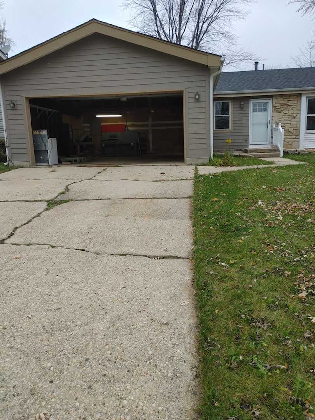 ranch-style house featuring a garage