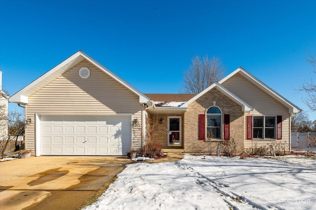 view of front of property with a garage