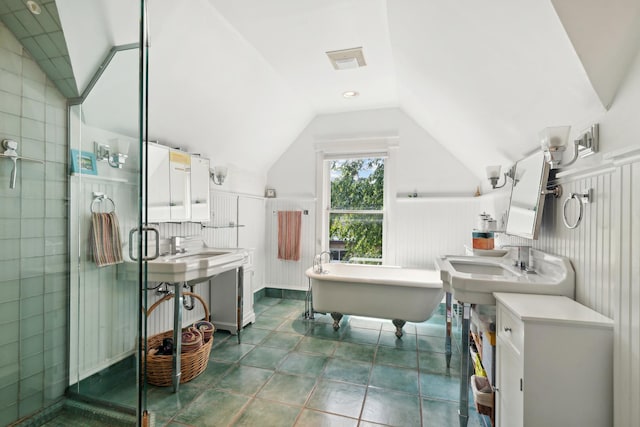 bathroom with sink, plus walk in shower, and vaulted ceiling