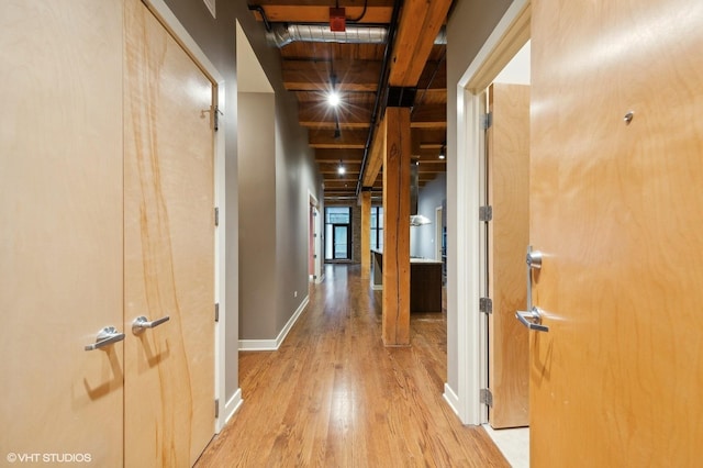 hallway with light wood-type flooring