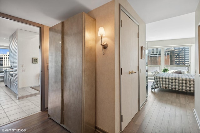 corridor featuring light hardwood / wood-style flooring