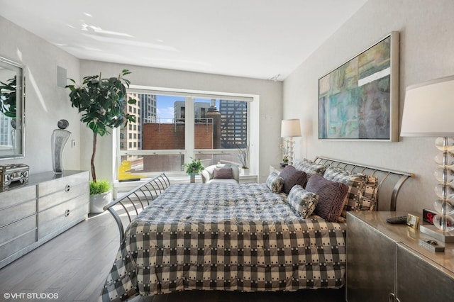 bedroom with wood-type flooring