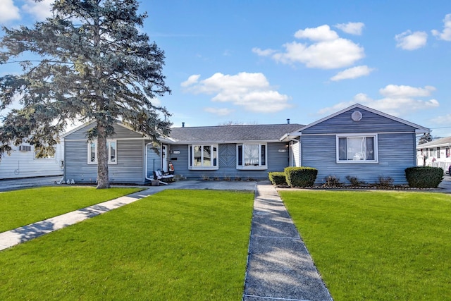 single story home with a front yard