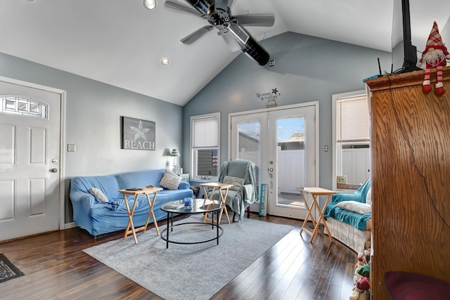 living room with french doors, dark hardwood / wood-style flooring, ceiling fan, and lofted ceiling