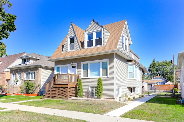 view of front facade featuring a front yard