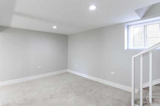 basement with light carpet