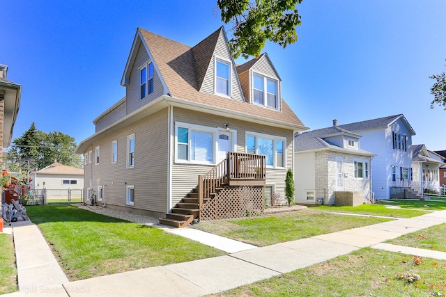 view of front facade with a front lawn