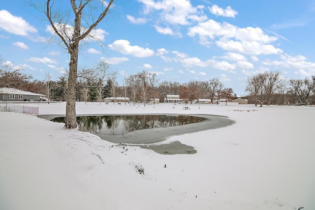 view of home's community with a water view