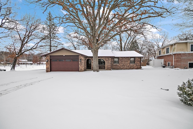 single story home featuring a garage