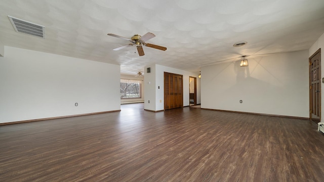 unfurnished living room with ceiling fan and dark wood-type flooring