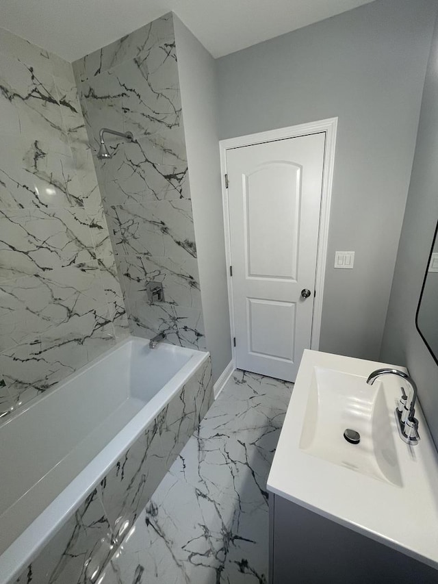 bathroom with vanity and tiled shower / bath combo