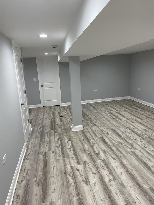 basement with light wood-type flooring