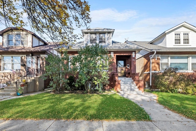 view of front of home with a front yard