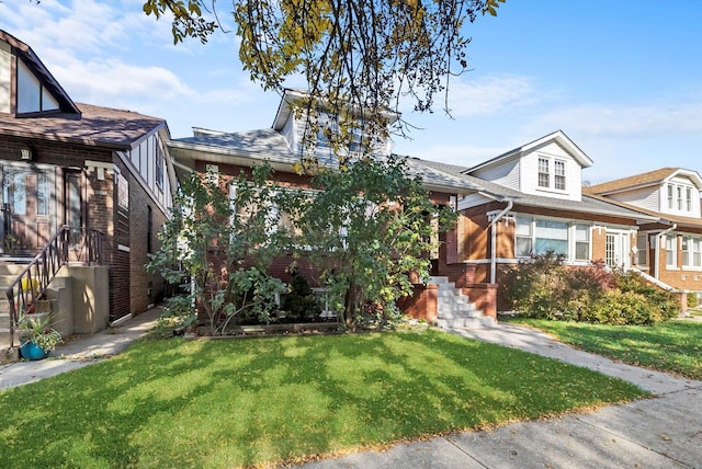 view of front of home featuring a front lawn