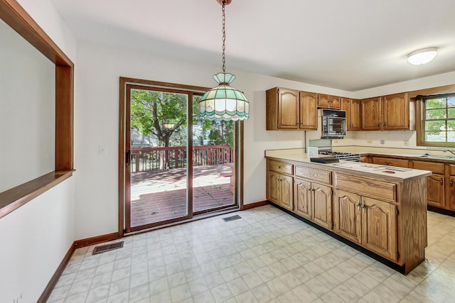 kitchen with hanging light fixtures and sink