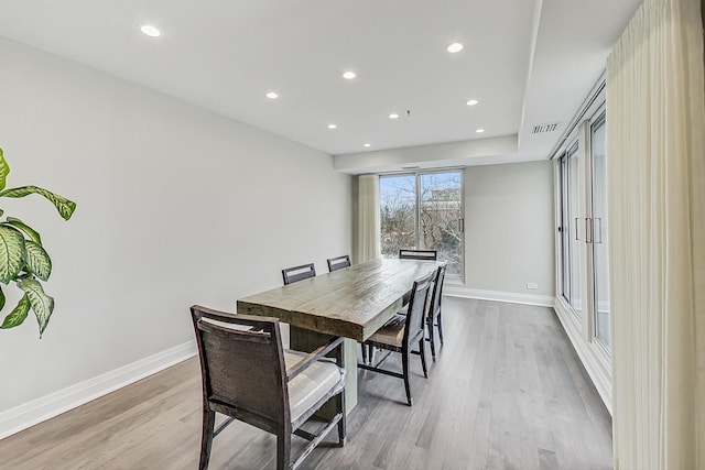 dining room with light hardwood / wood-style floors