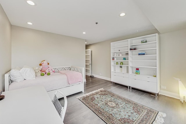 bedroom featuring dark wood-type flooring