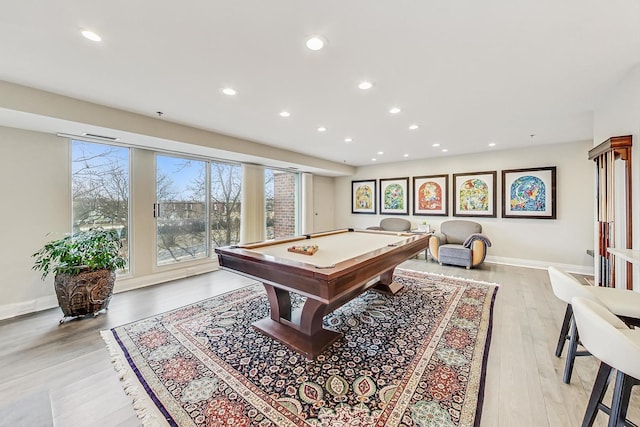 recreation room featuring pool table and light hardwood / wood-style flooring