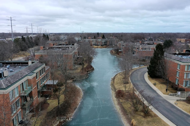 drone / aerial view featuring a water view