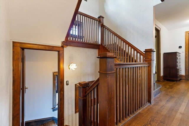 staircase featuring hardwood / wood-style flooring