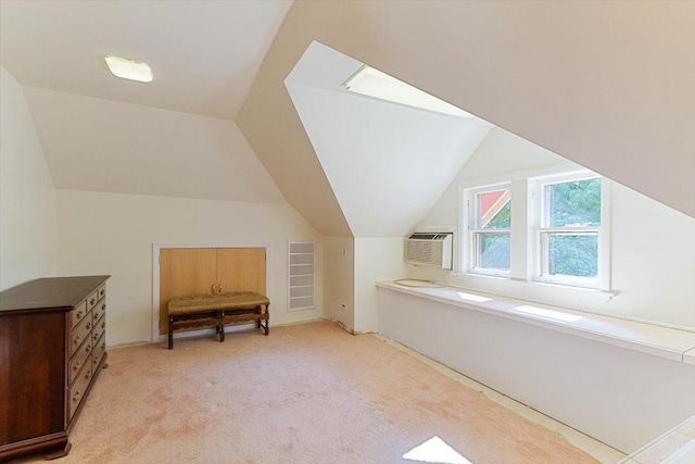 bonus room featuring an AC wall unit, light carpet, and lofted ceiling