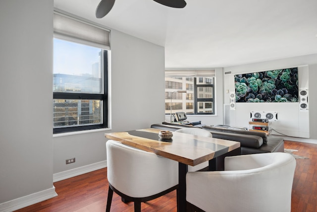 dining space featuring a wealth of natural light and hardwood / wood-style floors