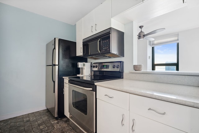 kitchen with white cabinetry, electric range, and ceiling fan