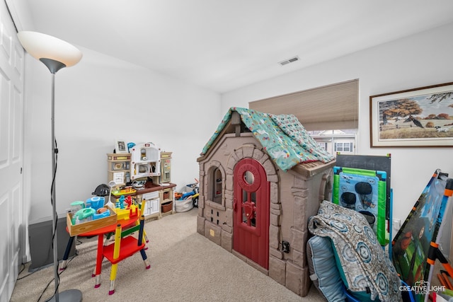 game room with light colored carpet