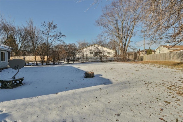 view of yard covered in snow