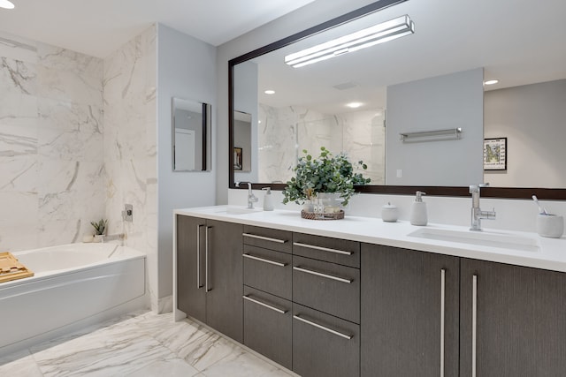 bathroom featuring vanity and shower with separate bathtub