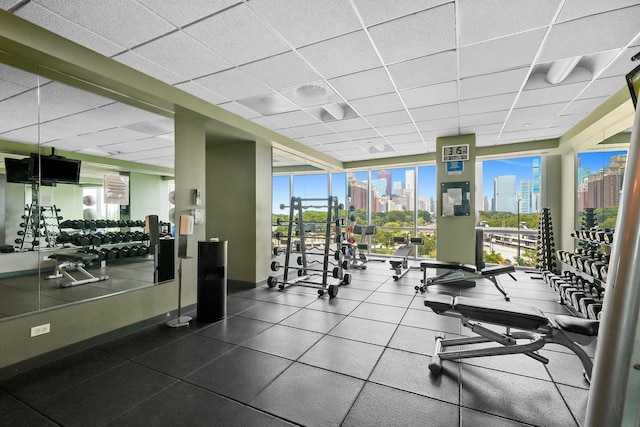 workout area with a drop ceiling