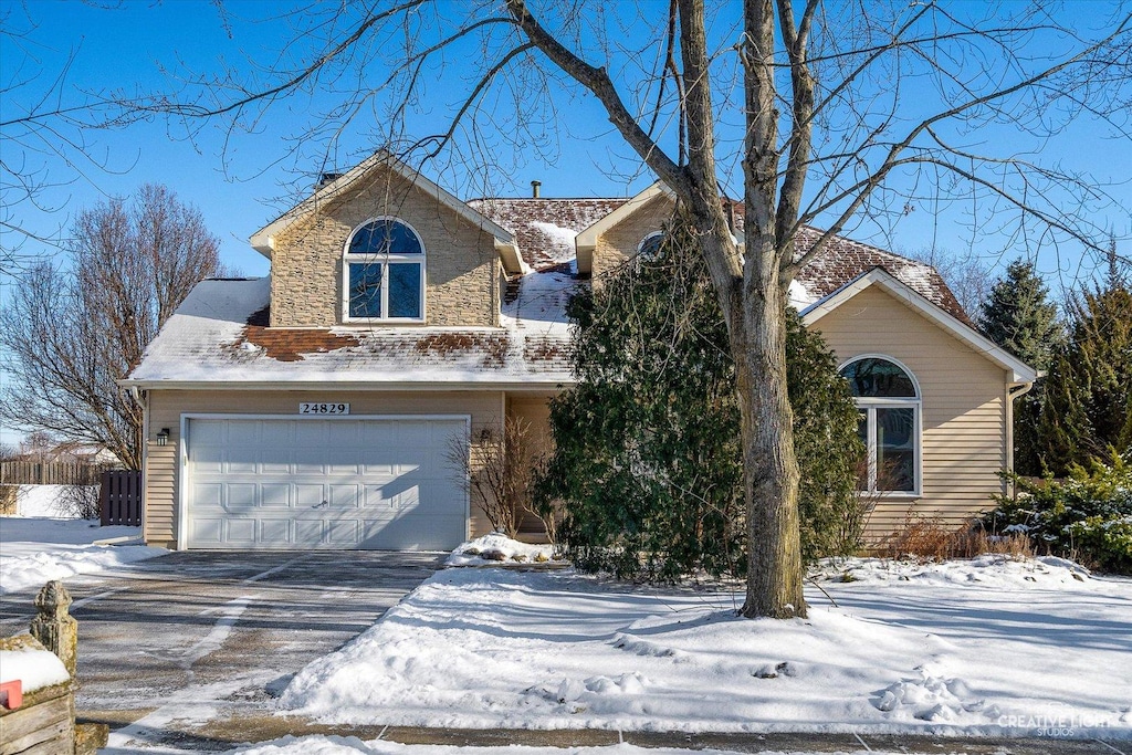 view of front of property featuring a garage