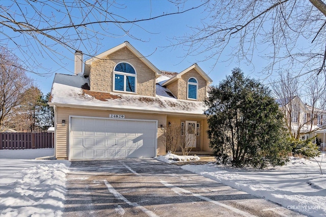 view of front of property with a garage