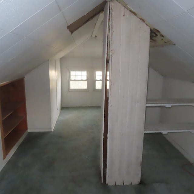 bonus room featuring vaulted ceiling