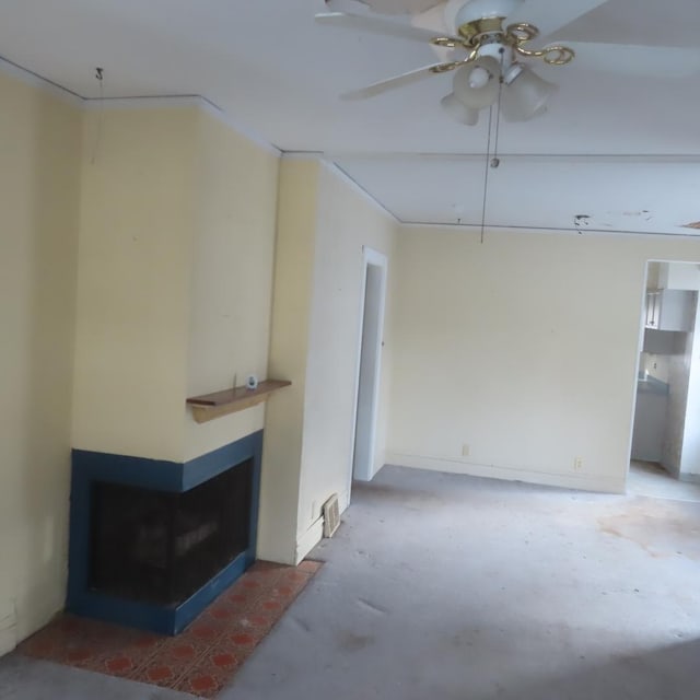 living room featuring ceiling fan and concrete floors