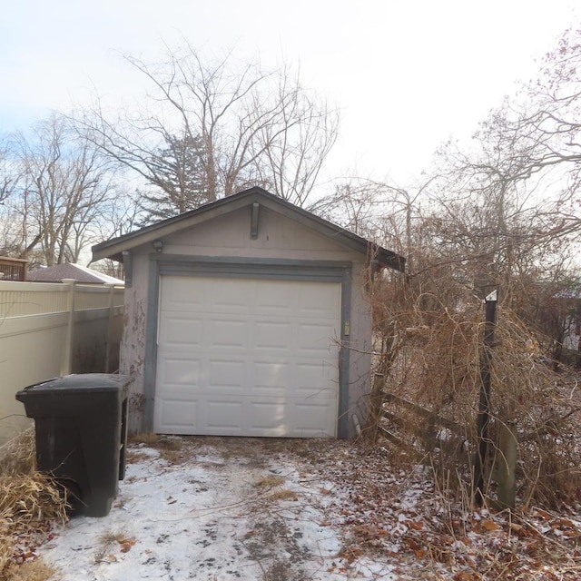 view of snow covered garage