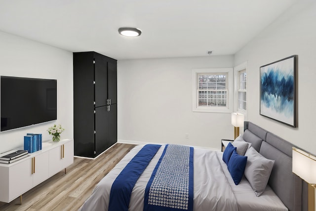 bedroom featuring light hardwood / wood-style flooring