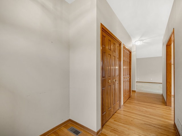 hall featuring light hardwood / wood-style floors