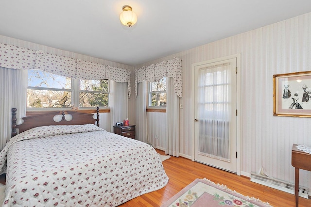 bedroom with light wood-type flooring