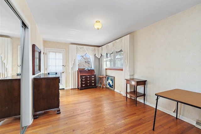 miscellaneous room with light wood-type flooring