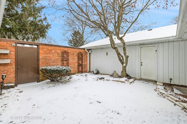 view of snow covered property