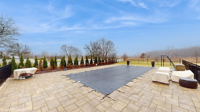 view of patio with a covered pool