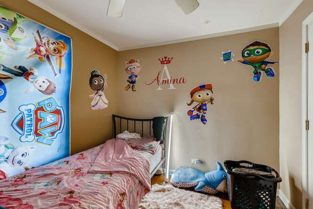 bedroom with ornamental molding