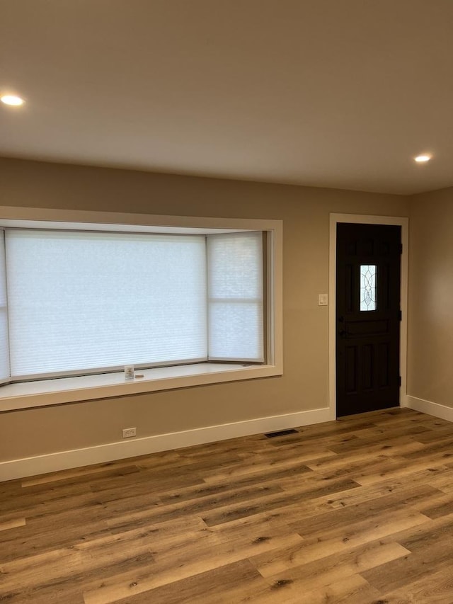 foyer entrance featuring light hardwood / wood-style floors