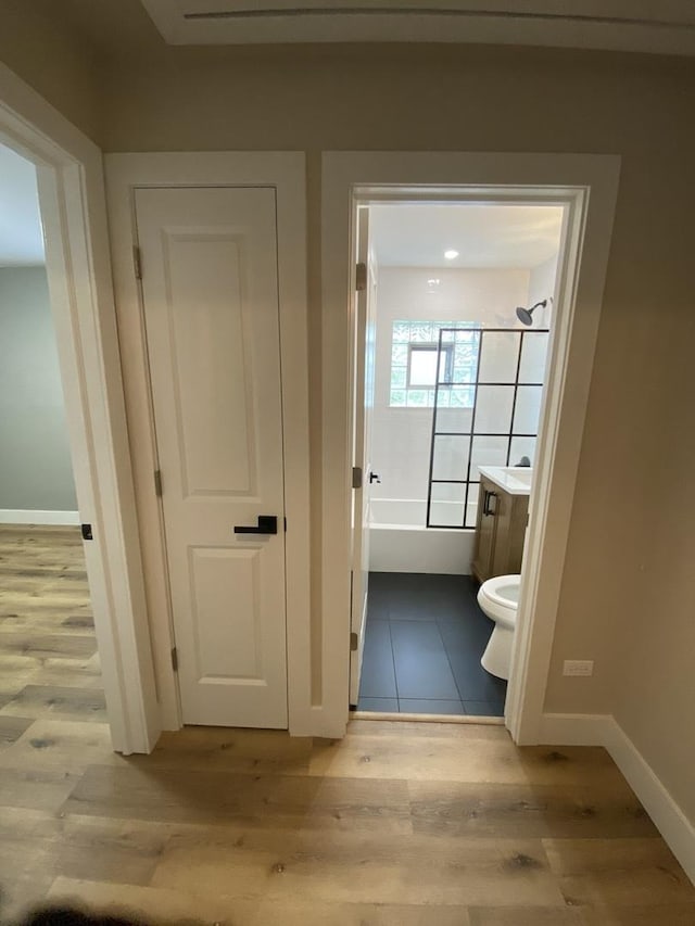 hallway featuring light hardwood / wood-style floors