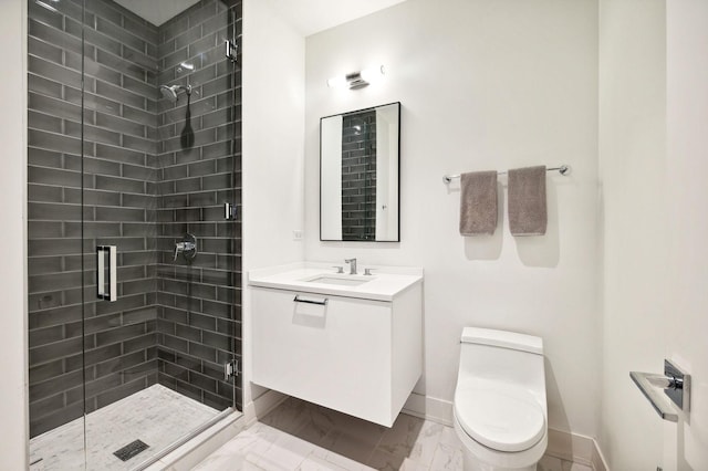 bathroom featuring vanity, toilet, and walk in shower