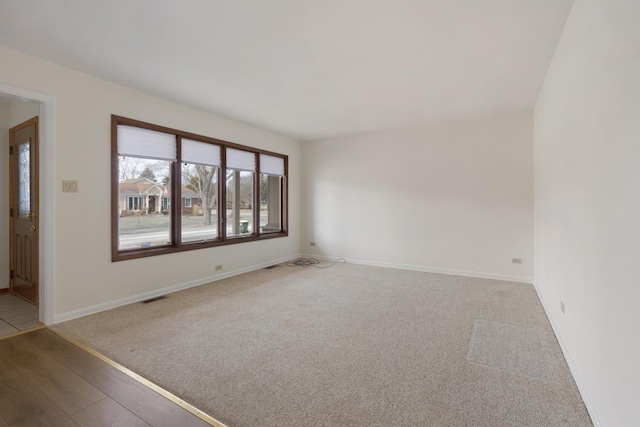 empty room with carpet floors