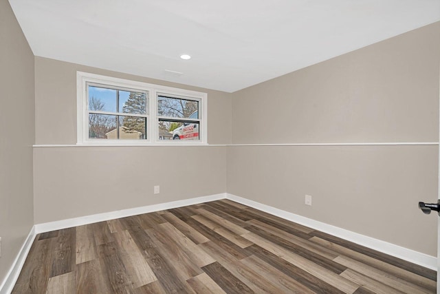 empty room with wood-type flooring